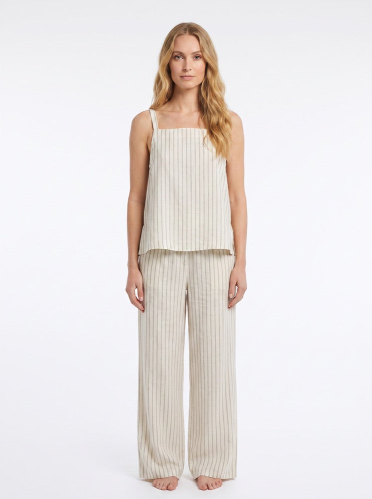 AI-generated studio render — full linen outfit on a chosen AI model